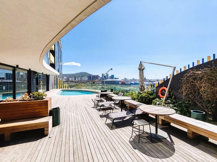 For Sale: Airbnb-friendly studio in Woodstock with rooftop pool and gym access.