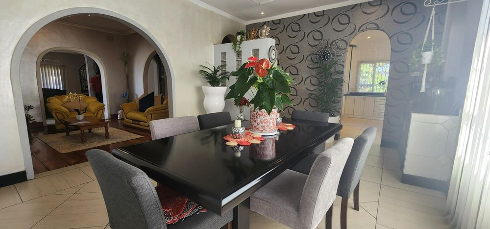 Dining area leading to kitchen