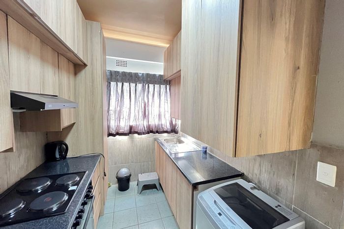 Cyrildene Apartment For Sale: 2 Bedrooms, Study, Balcony, Open-Plan Living Space.