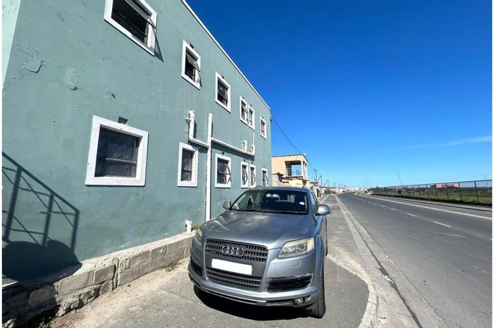 For Sale: 12-bedroom house in Delft Central with rental income and parking.