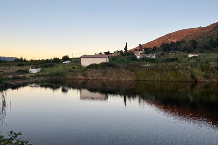 Uniondale Central Farm For Sale: 76 ha with water rights, cottages, and tourism potential.