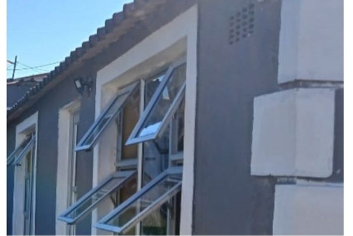 Umlazi Central House For Sale: Family home with rental cottages, R9,500/month income.