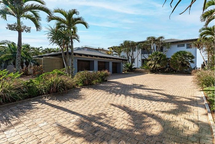 Beachfront house in Tinley Manor for sale with direct beach access and sea views.