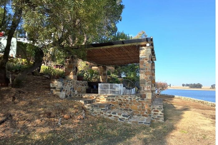 For Sale: Apartment at Boschenvaal River Front Lodges with waterfront access and amenities.