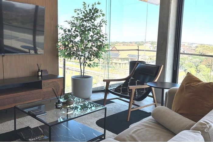 Penthouse For Sale in Ballito Central: Rooftop pool, spacious layout, prime location.