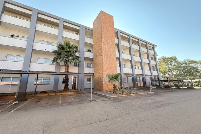 For Sale: 2-bedroom apartment in Waterkloof Glen with garden, parking, and security.