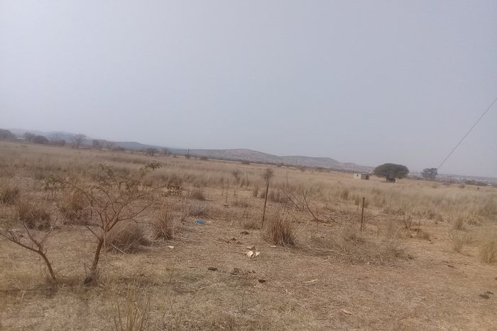 For Sale: 10.3-hectare farm in Dalmada AH with borehole, ideal for agriculture.