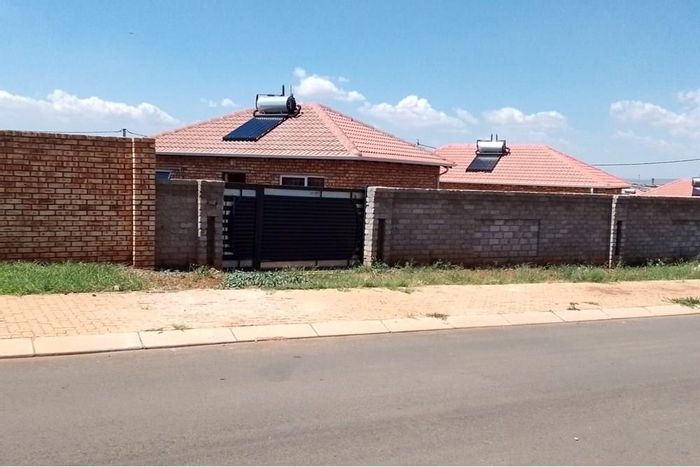 For Sale: House in Lufhereng with 2 bedrooms, walled yard, and future development potential.