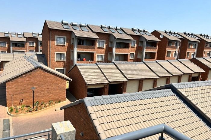 2-Bedroom Apartment For Sale in Sagewood with Garage, Pool, and Clubhouse Access.