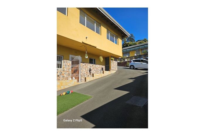 For Sale: Spacious 18-bedroom house in Claire Estate with ample parking and units.