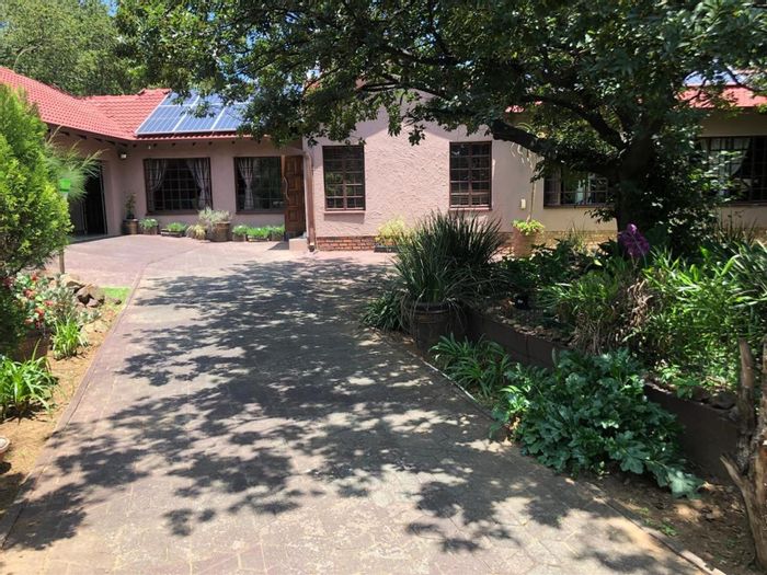 House For Sale in Brackenhurst: Eco-friendly, heated pool, spacious rooms, and entertainment area.