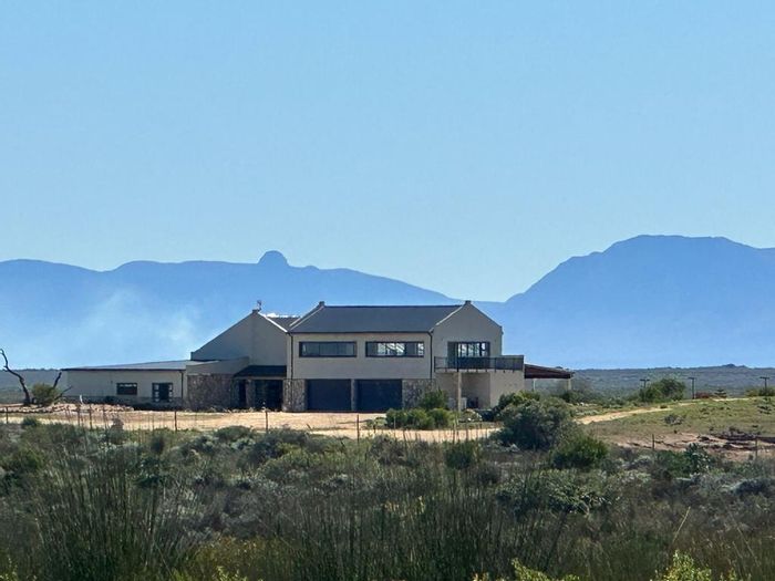 For Sale: Farm in Stilbaai Rural with off-grid living, ample water, and farming potential.