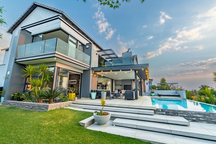 House For Sale in Copperleaf Estate: 4 beds, pool, golf course access, luxury amenities.