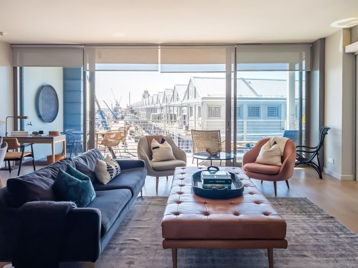 Waterfront Apartment For Sale: 2 bedrooms, pool, gym access, and secure parking.