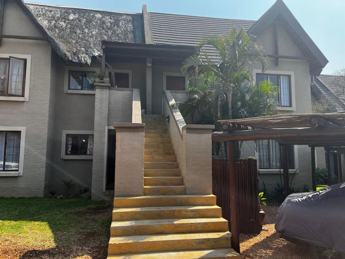 2-Bedroom Apartment with Loft in Hoedspruit Central - For Sale, Gated Community Amenities.