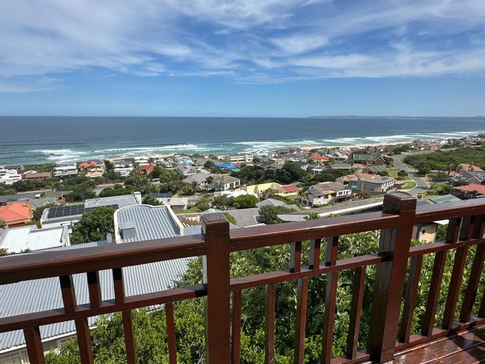 For Sale: Versatile multi-level house in Outeniqua Strand with sea views and rental potential.