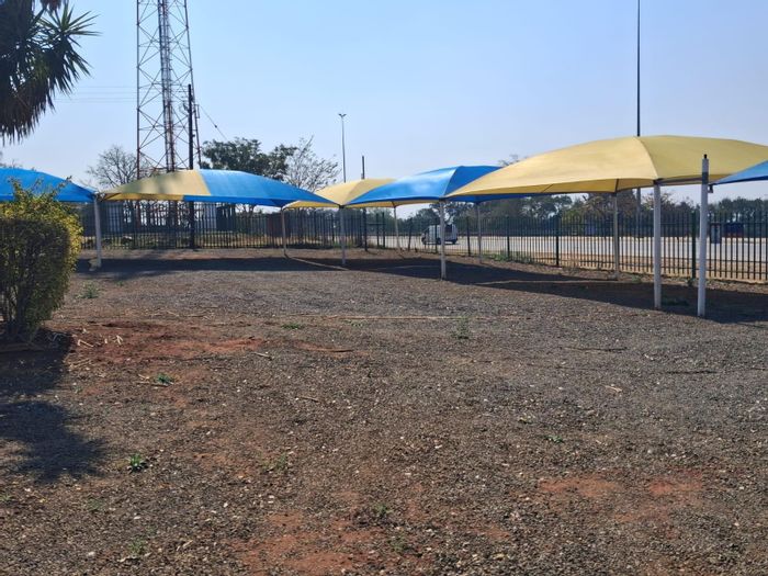 Waterkloof AH For Sale: Prime 10,000 m² Commercial Land with Office Suites and Storage.