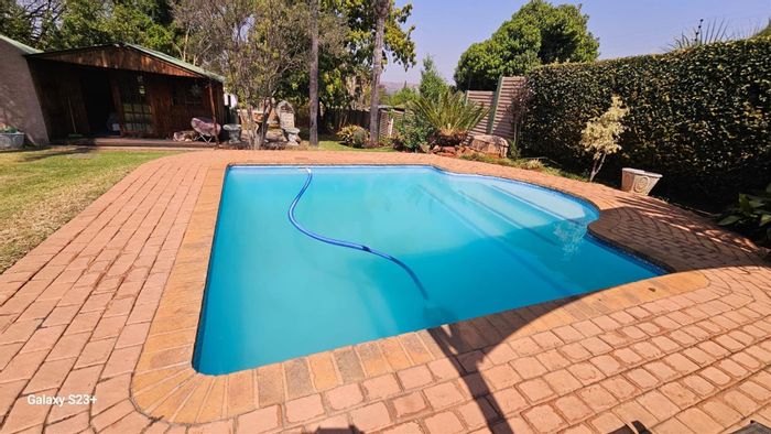 Mountain View House For Sale: 5 Bedrooms, Indoor Pool, Security Features, Landscaped Yard.