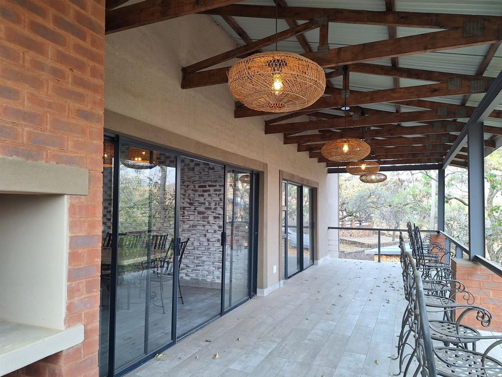 Stoep with sliding doors to main bedroom and livin