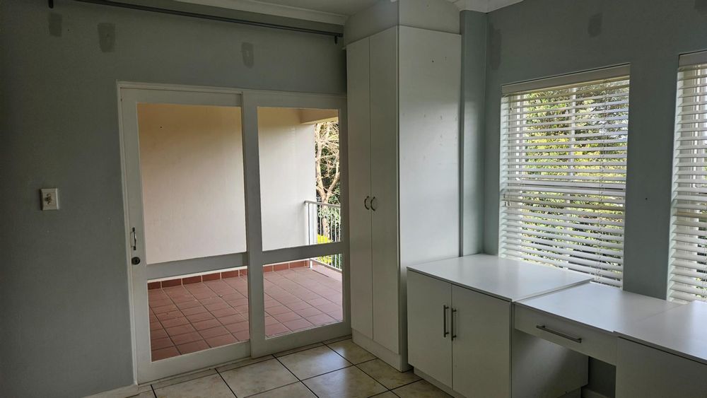 Bedroom leading to patio