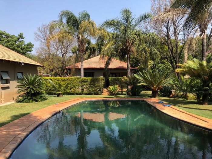 Montana Small Holding For Sale: Three homes, pool, dual living, and development rights.