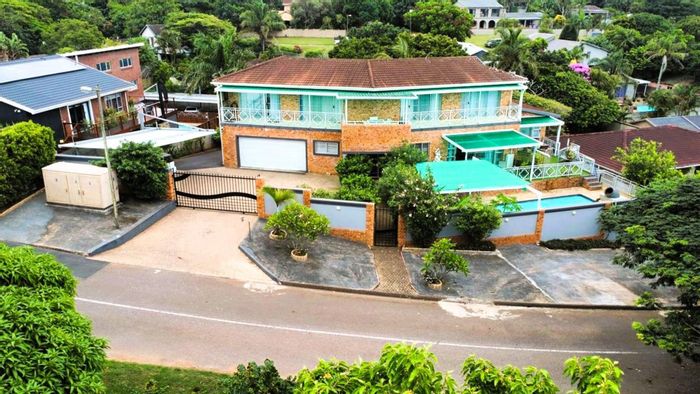 For Sale: Income-Generating House in Ballito Central with Ocean Views and Pools.