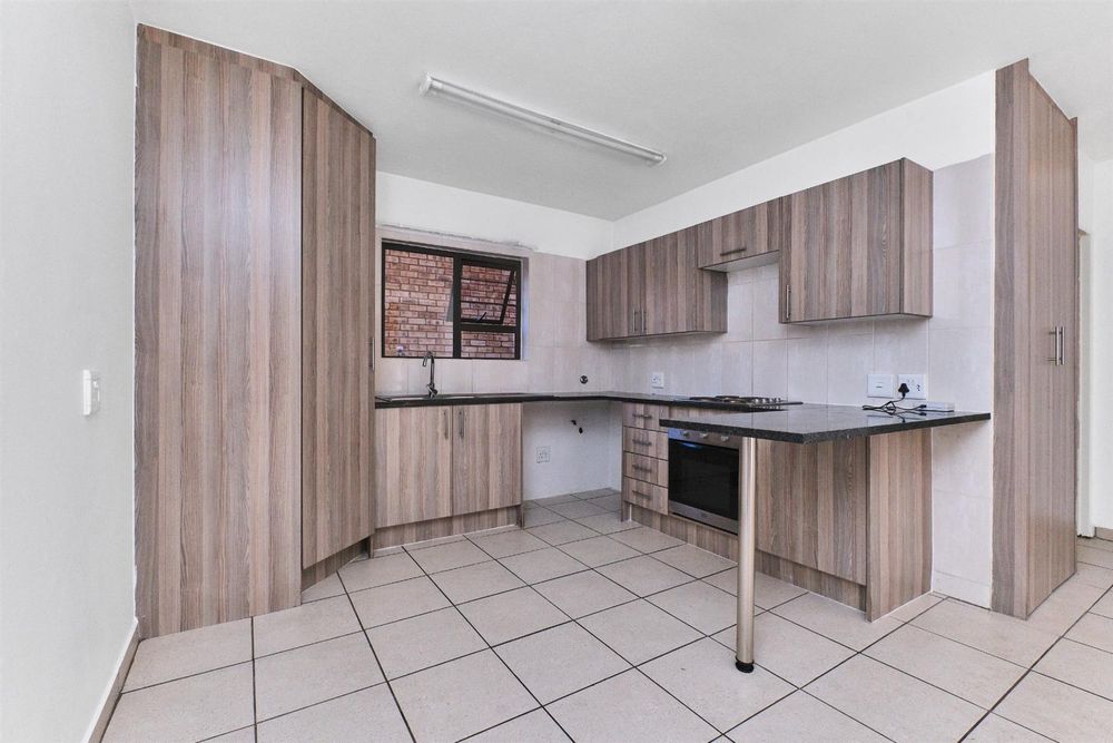 Kitchen cupboards including pantry cupboard