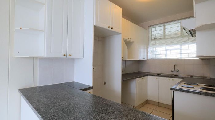 1-Bedroom Apartment To Rent in Illovo with Balcony, Parking, and Playground Access.