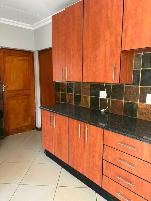 For Sale: Bendor Townhouse with private garden, 3 bedrooms, lock-up garage.