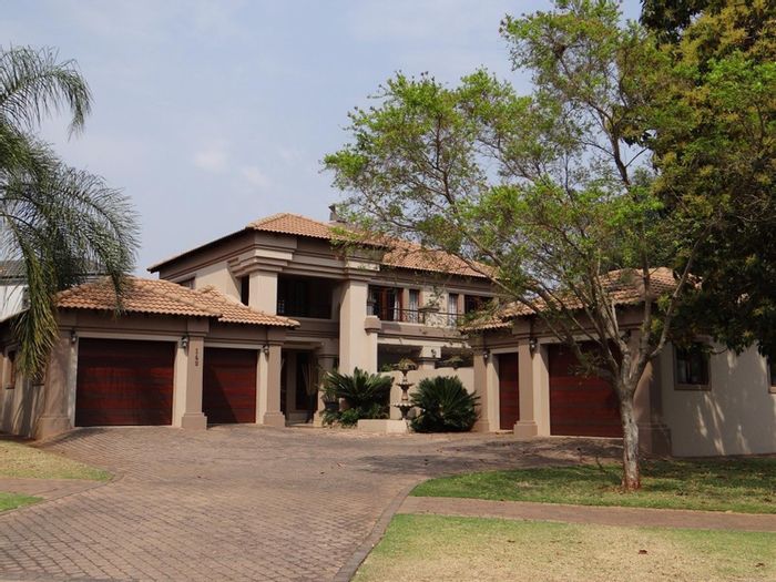 For Sale: 7 Bedroom House in Midstream Estate with pool, patio, and garages.