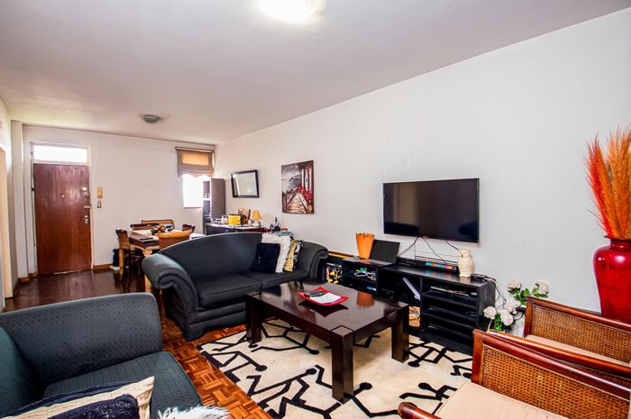 1.5 Bedroom Apartment For Sale in Kew with balcony, garage, and security features.