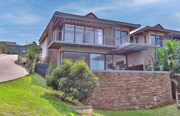 For Sale: Zimbali Townhouse with 4 Bedrooms, Pool, and Scenic Outdoor Spaces.