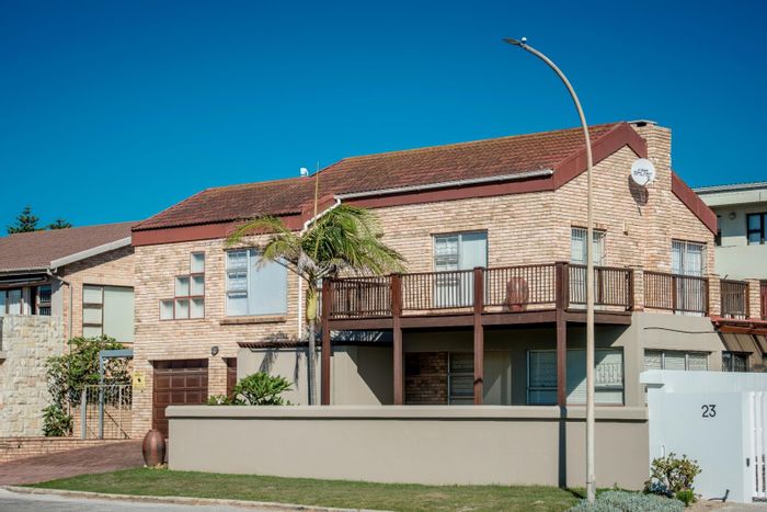 Beachfront house in Jeffreys Bay Central for sale, 5 beds, 3 baths, ocean access.