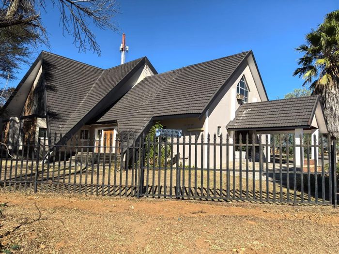 For Sale: Unique church building in Arborpark, 3,900m² lot, investment potential.