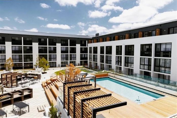 For Sale: Apartment in Stellenbosch Central with rooftop pool, cinema, and fitness center.