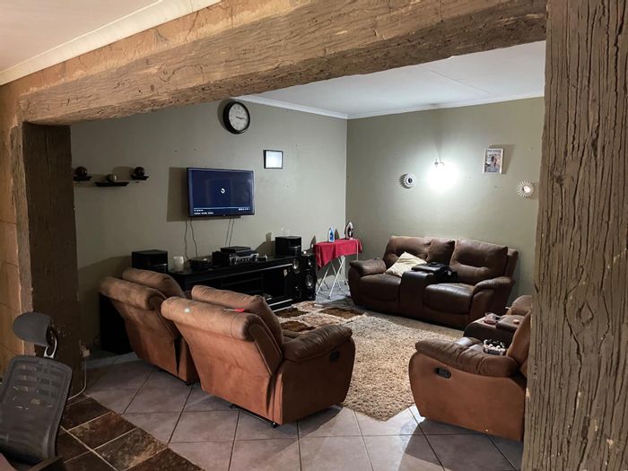 7-Bedroom House For Sale in Kriel Central with rental income potential and carports.