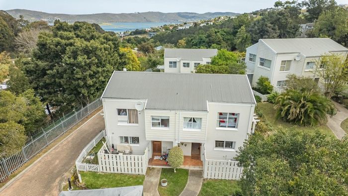 For Sale: Townhouse in Knysna Central with private garden, clubhouse, and secure entry.