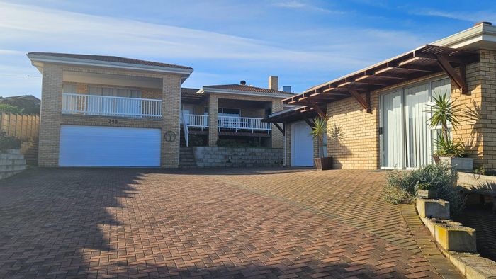 Spacious 6-Bedroom House with Flatlet and Ocean Views in Dana Bay For Sale.