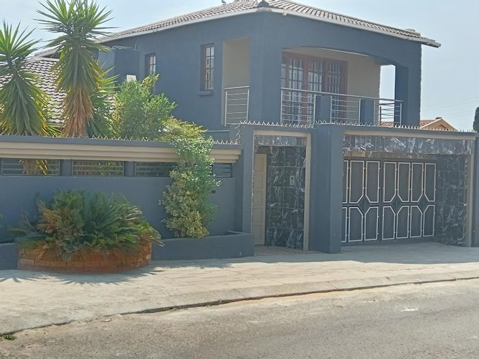 For Sale: House in Dhlamini with rental units, garage, and business potential.