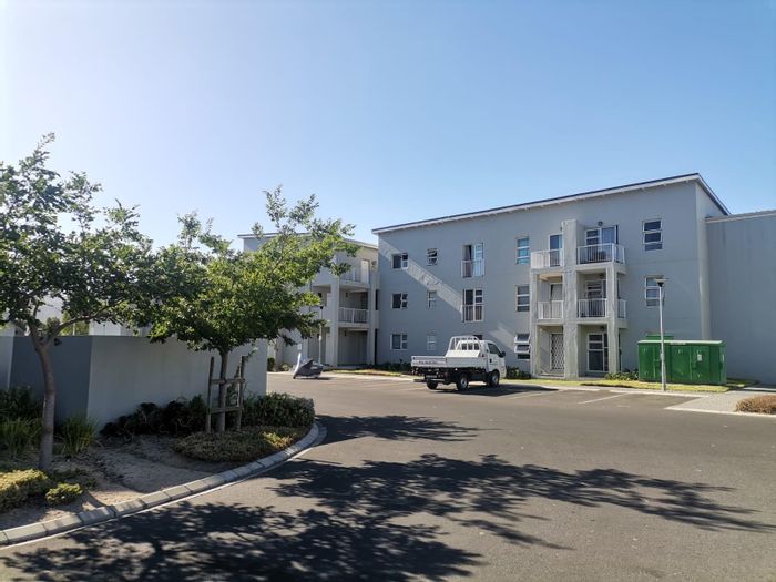 1-Bedroom Apartment For Sale in Paarl South with balcony, security, and communal amenities.