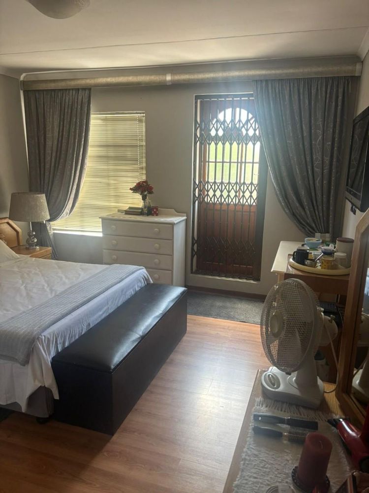 Main bedroom, leading out to private patio