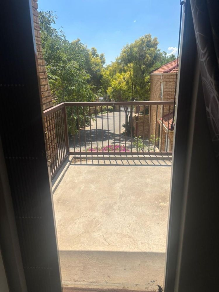 Door leading from main bedroom to private patio