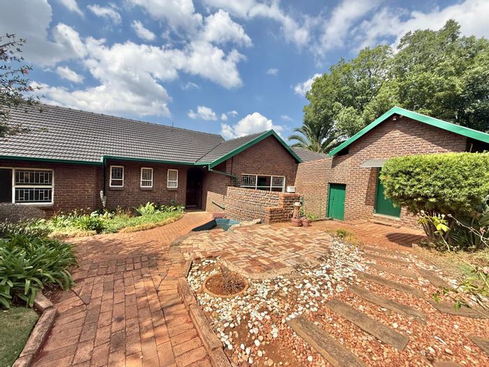For Sale: House in Monument Park with pool, braai, and spacious living areas.