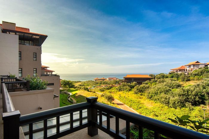 Zimbali Apartment For Sale: One-bedroom, sea views, access to luxury amenities.