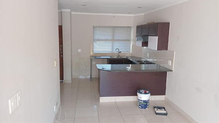1-Bedroom Apartment To Rent in Sandton Central with convenient amenities and lock-up features.