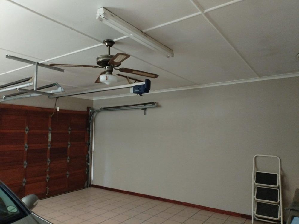 With Automated wooden roll up doors