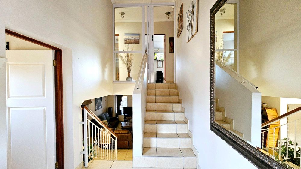 ENTRANCE HALL AND STAIRCASE