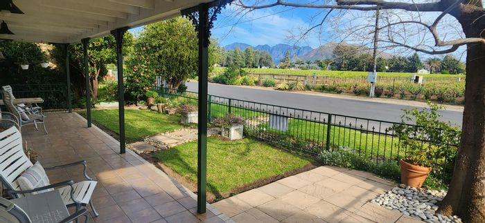 4-Bedroom House For Sale in Rawsonville with scenic views and spacious living areas.