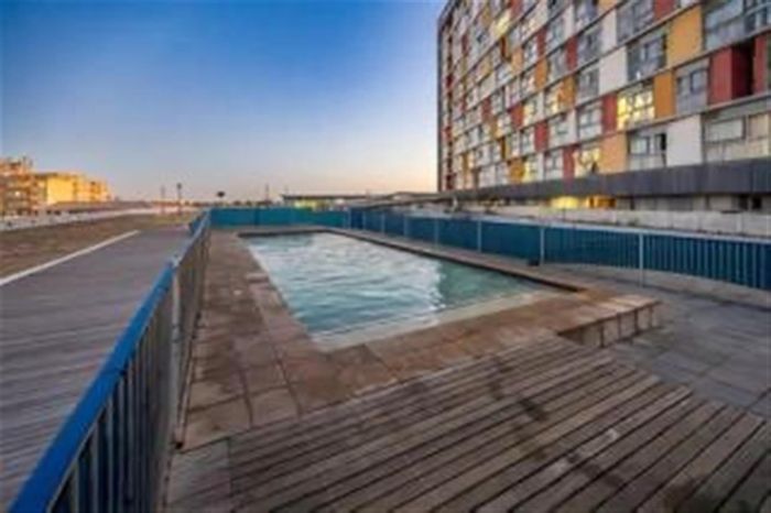 For Sale: Apartment in Goodwood Estate with pool, gym, and secure living.