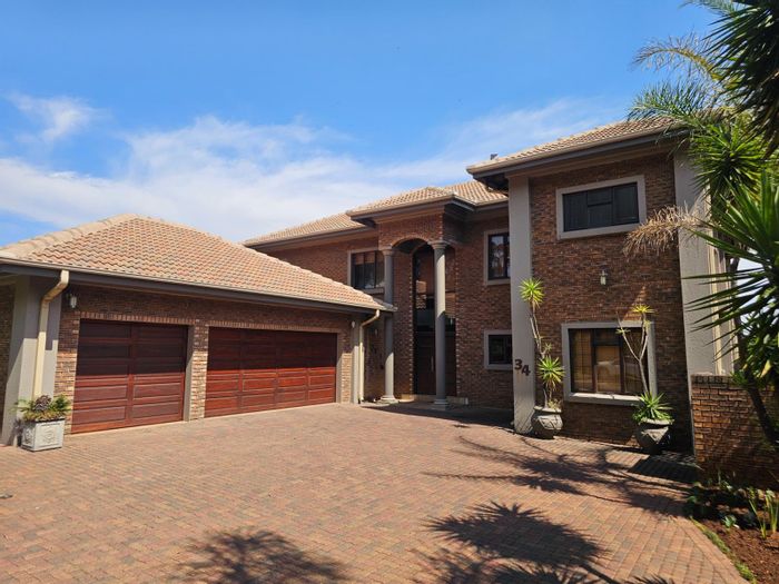 For Sale: House in Roberts Estate with pool, braai room, and three garages.